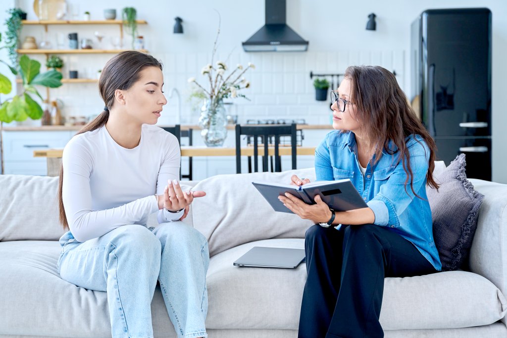 Psychiatric nurse providing supportive mental health care at home