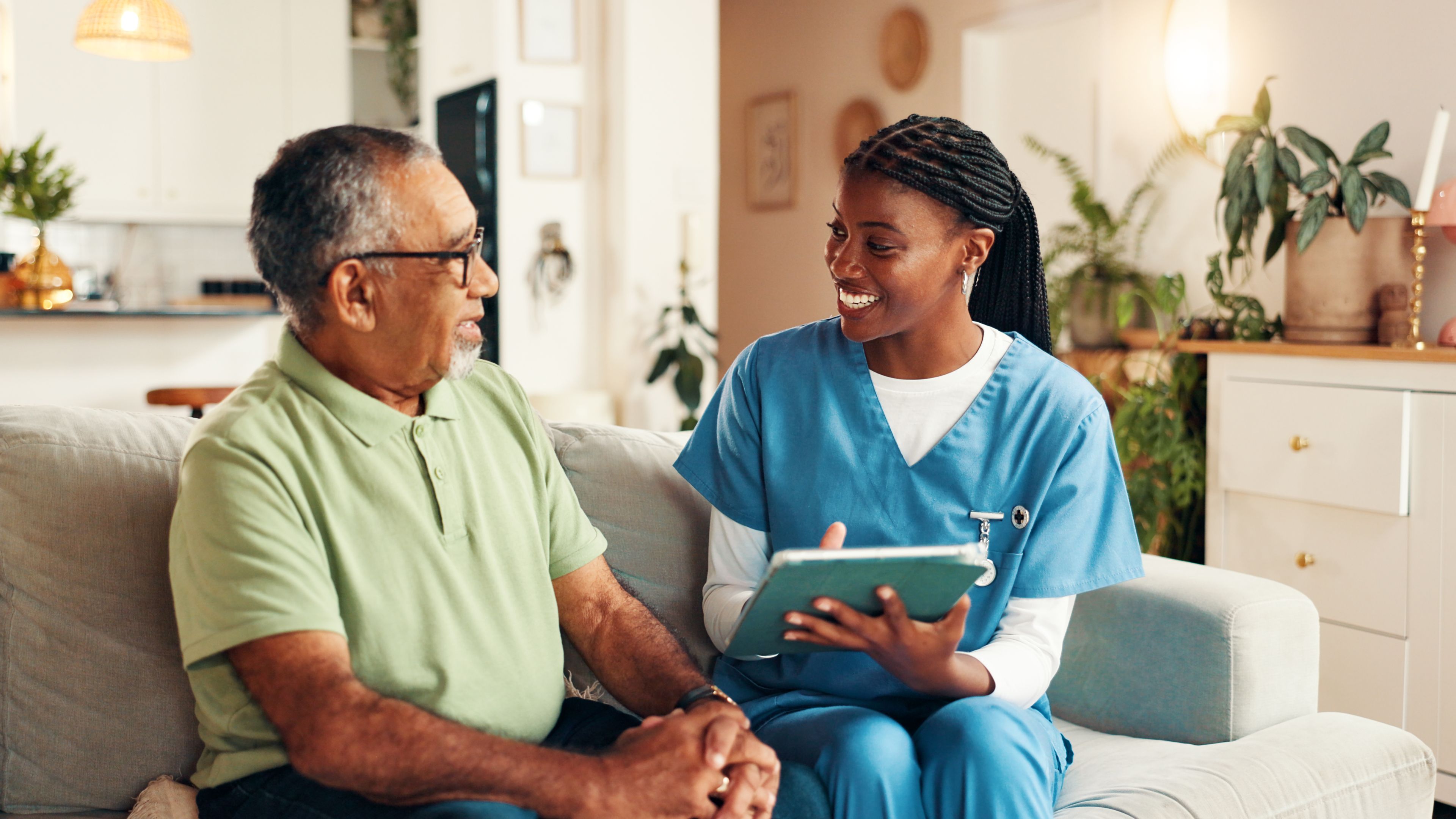 Caregiver reviewing care plan with patient
